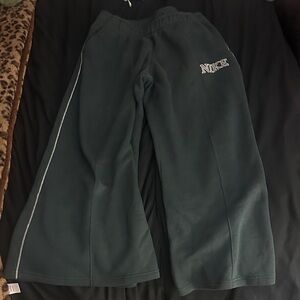 Nike Dark Green sweatpants with White Accent. Wide bottom. Used 4 times